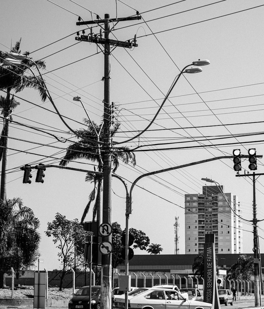 cars, traffic, streets, stoplights, lamp posts, crossroads, intersection, junction, roads, city, urban, transport, vehicles, street photography, black and white, monochrome